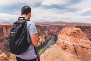 Man Standing Atop the Grand Canyon