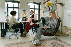 Best Small Business Marketing Company Jensen Beach Florida a Group of People Working in a Meeting Room