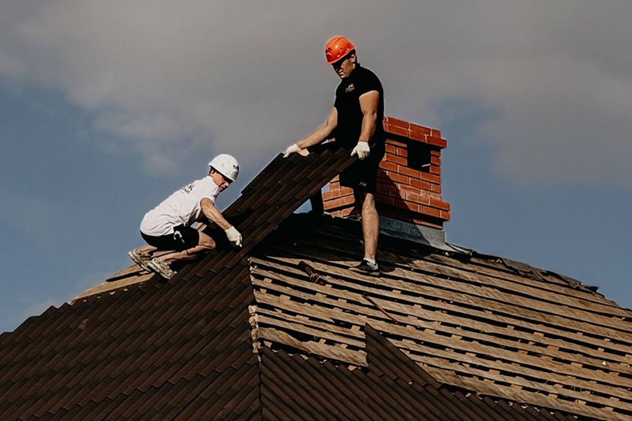 Home Services Marketing in Jupiter Florida Two Men on a Roof Installing Panels