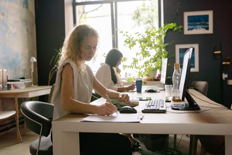 Best Google Business Profile Marketing Agency in Port Salerno Florida Two Women Working at Computers in an Office