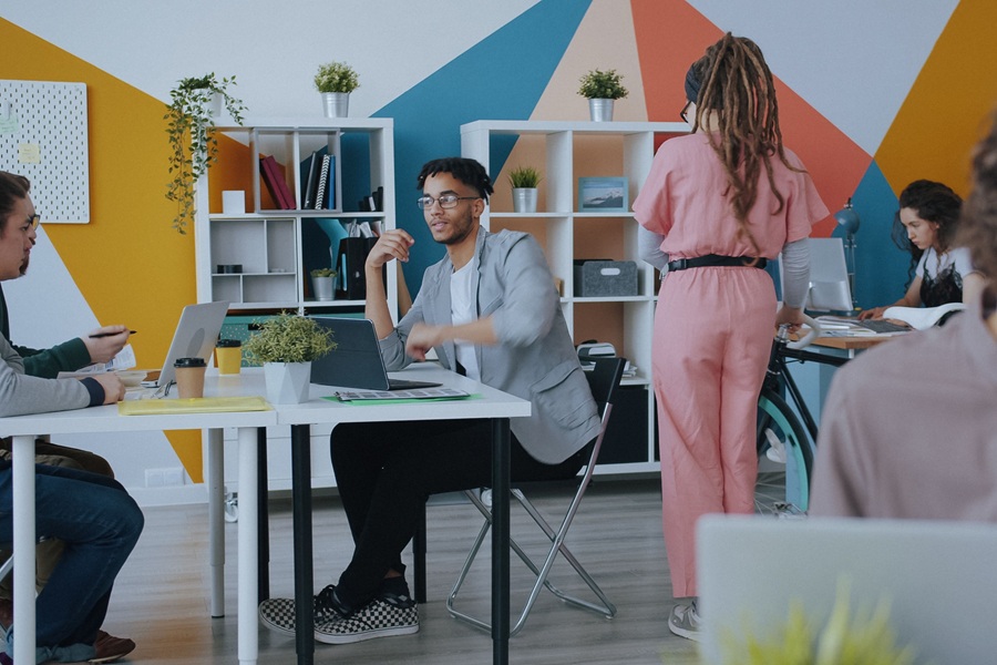 Best Google Business Profile Marketing Agency in Port Salerno Florida a Group of People Working in a Colorful Office