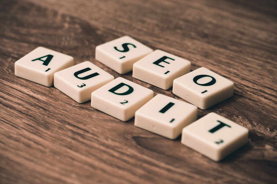 Best SEO Services for Sewalls Point Letter Tiles Spelling Out SEO Audit on a Wooden Surface
