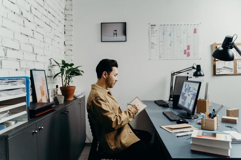 Best Small Business Marketing Services in Port Salerno Florida a Man Working at a Desktop Computer