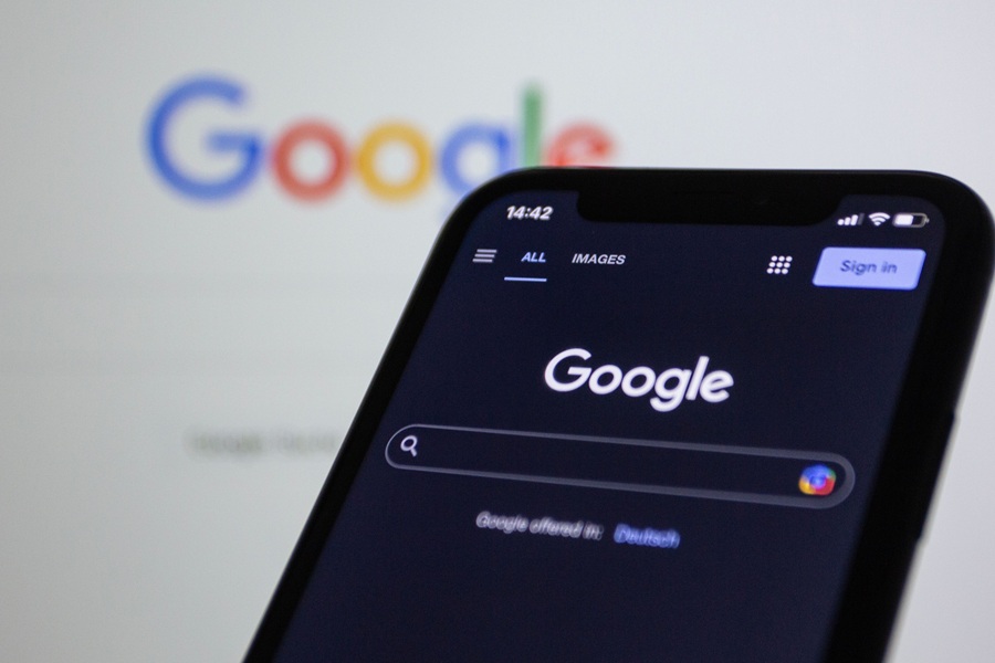 Best SEO Services for Stuart Florida a Phone with Google on the Display and a Computer Display in the Background That Also Says Google