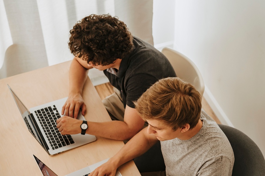 Best SEO Services in Treasure Coast Two Men Sitting at Laptops