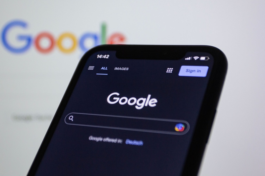 Best SEO Services in Treasure Coast Close Up of a Smart Phone with Google on the Display