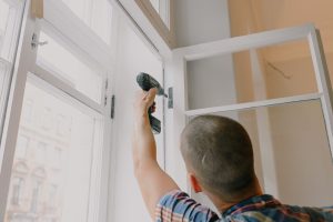 SEO Marketing for Home Service Businesses in Palm City Florida a Man Installing a Window in a Home