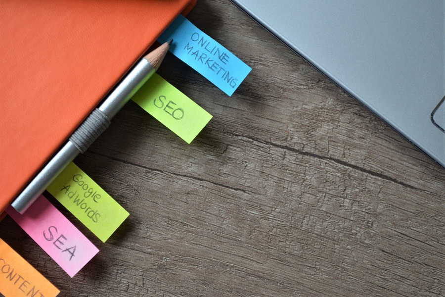 SEO Marketing for Home Service Businesses in Palm City Florida a Lap Top with Sticky Notes Saying Digital Marketing SEO