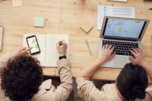 SEO Services for Trade Companies in Martin County Florida People Working at a Desk on Laptops